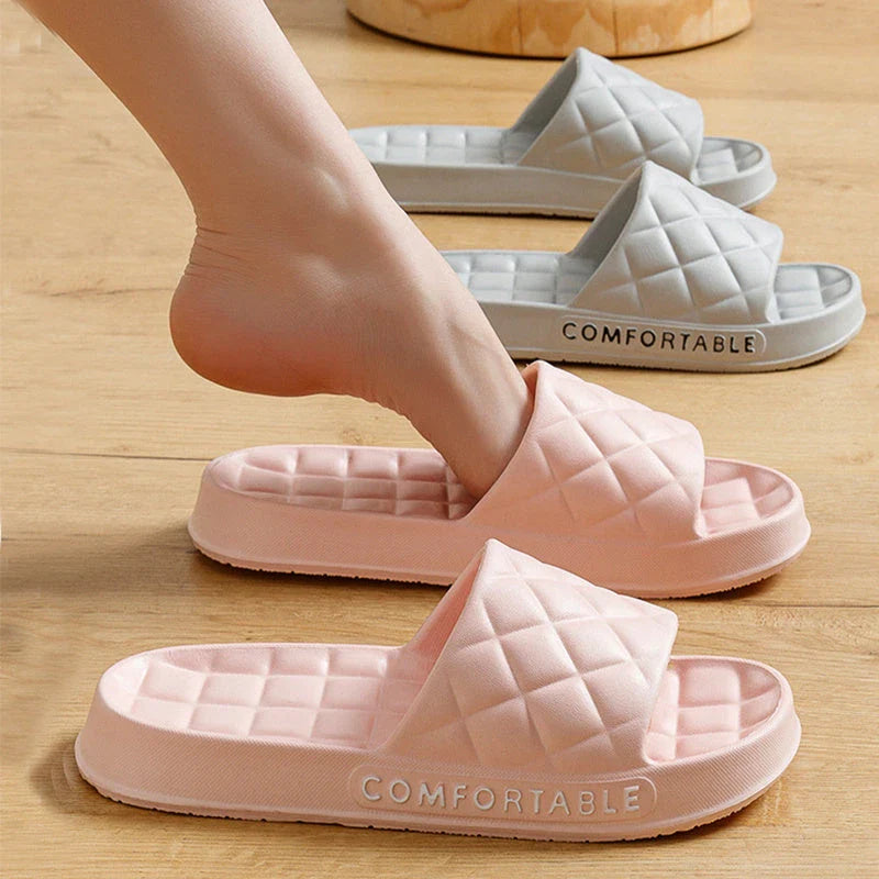 Stylish plaid slippers with soft, cushioned soles for comfortable indoor wear