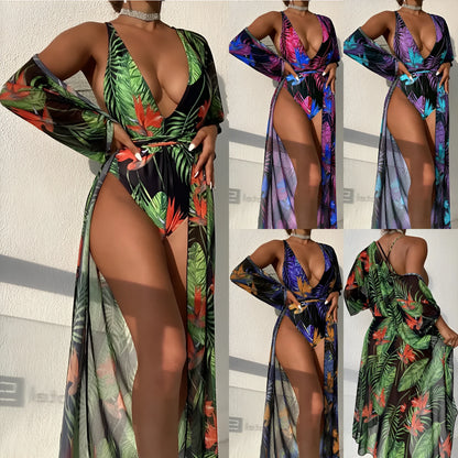 Women's three-piece polyester swimsuit set with one-piece swimsuit and matching cover-up in a pattern design.