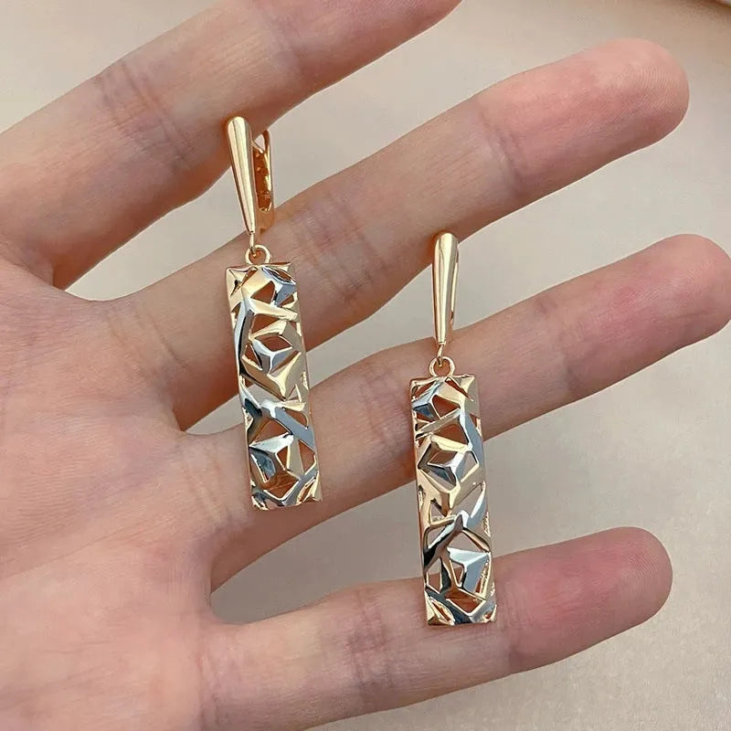 Hollow stud earrings with a rectangular geometric shape, made from electroplated alloy, featuring a two-tone colour picture style design suitable for women.