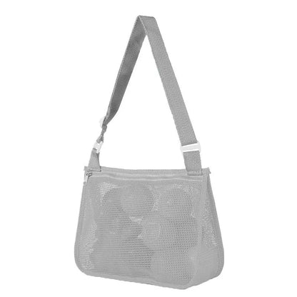 Blue children's drawstring travel storage bag made of nylon mesh for organising toys and clothes.