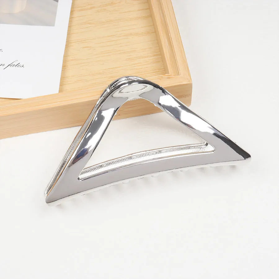 Silver metal hair claw barrette example from a range of 44 Korean-style designs.