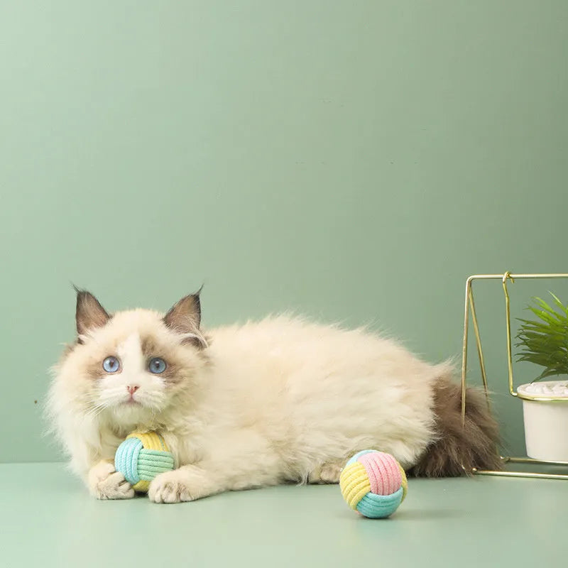 Handmade blue powder, green blue, and pink green plush cat toy ball with dental floss core for teeth grinding