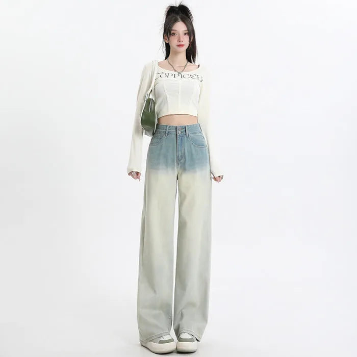 Women's gradient blue denim straight-leg trousers with 100% cotton fabric, showing colour transition and straight-leg silhouette