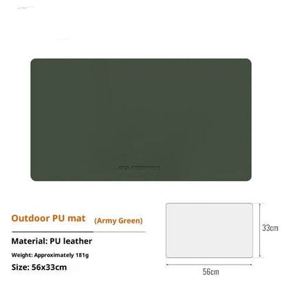 Waterproof heat insulation table mat in army green colour measuring 56×33cm on wooden dining table