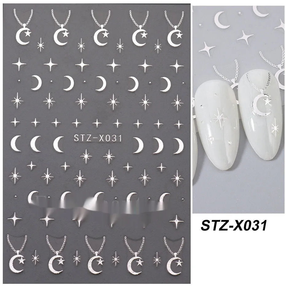 Assortment of black and silver nail sticker designs including cartoon and French tip patterns on a plastic sheet.