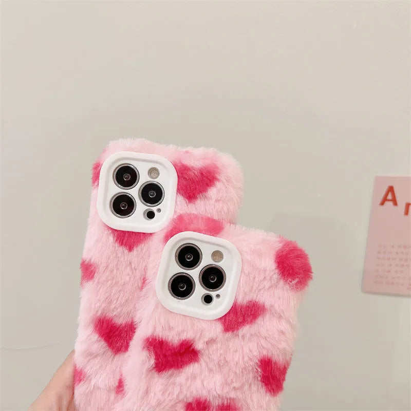 Pink silicone iPhone case with a cartoon design on the back