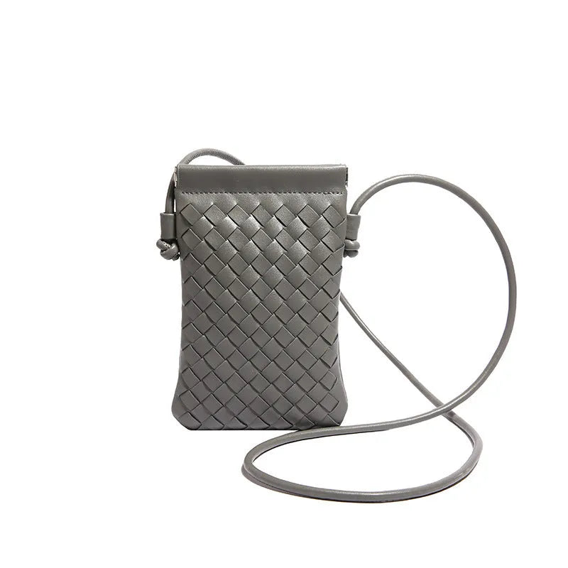 Vintage weave crossbody phone bag in pu leather showing vertical square design and dark cell interior