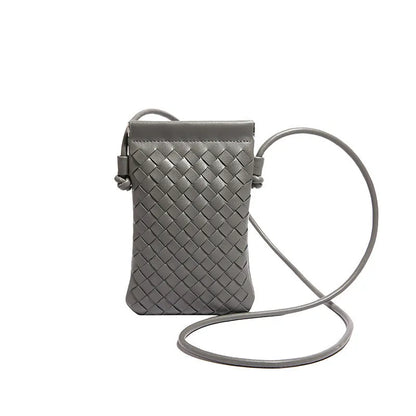 Vintage weave crossbody phone bag in pu leather showing vertical square design and dark cell interior