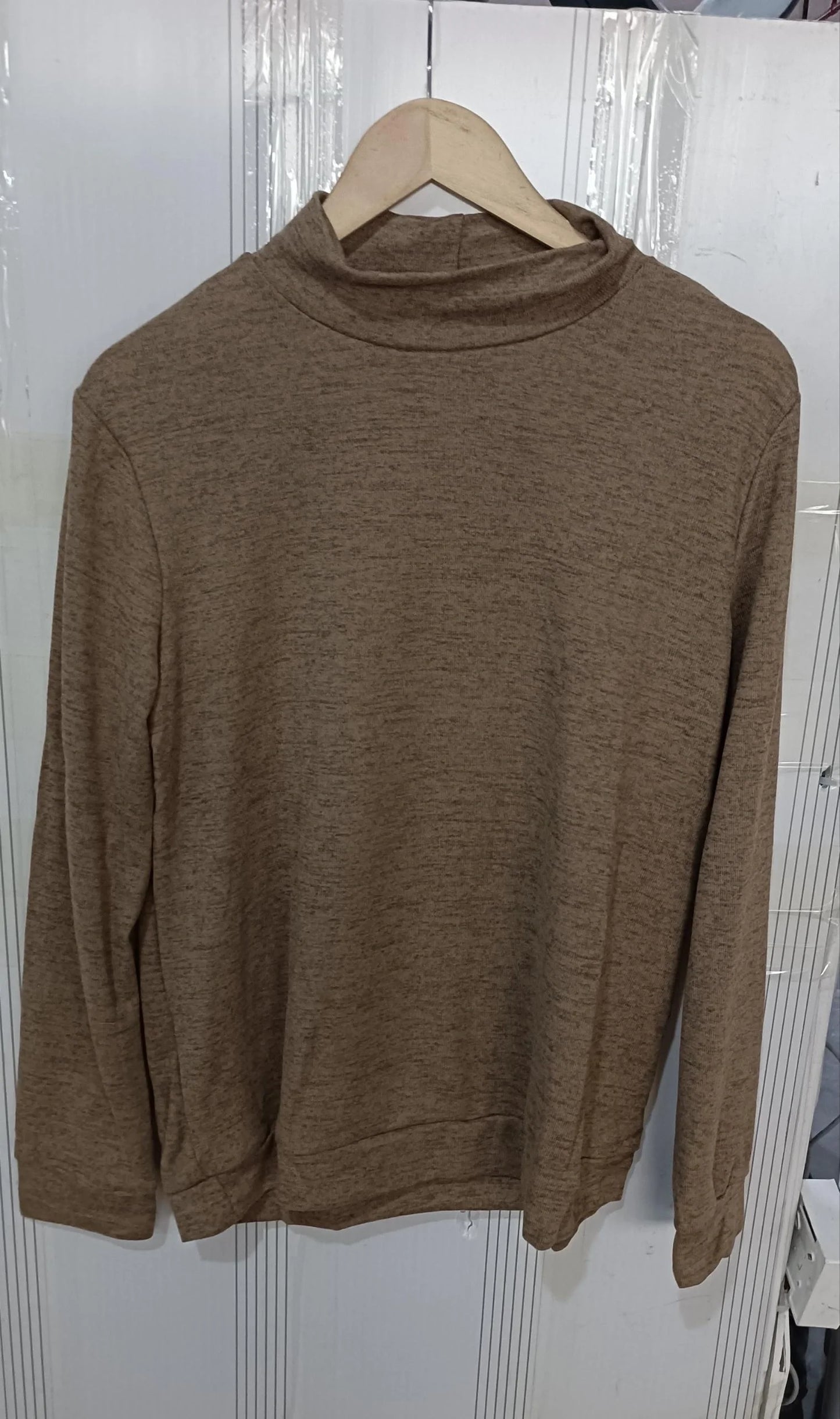 Cosy knitted pullover sweaters in a range of classic British colours for autumn and winter fashion