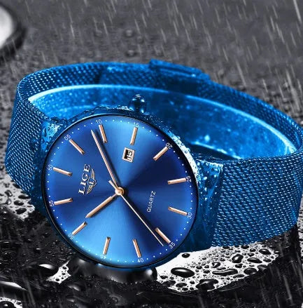 Men's stainless steel watch with 40mm dial on wrist, showing all-black colour option
