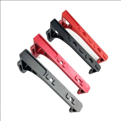 Metal hand stop accessory for Picatinny rail systems in black and red colour options