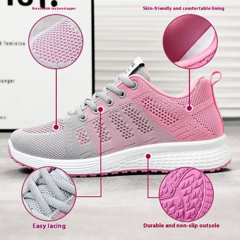 Women's flyknit running shoes in grey pink with soft sole and lace-up front.