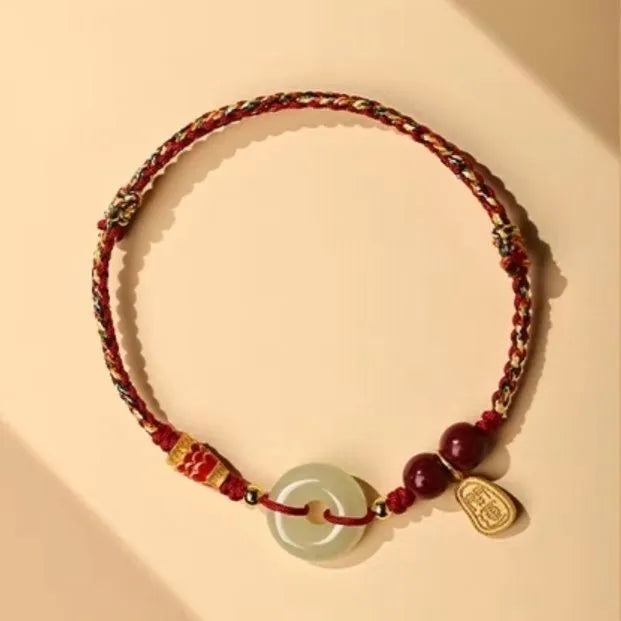 Hetian jade peace buckle bracelet with 10mm beads on red braided rope