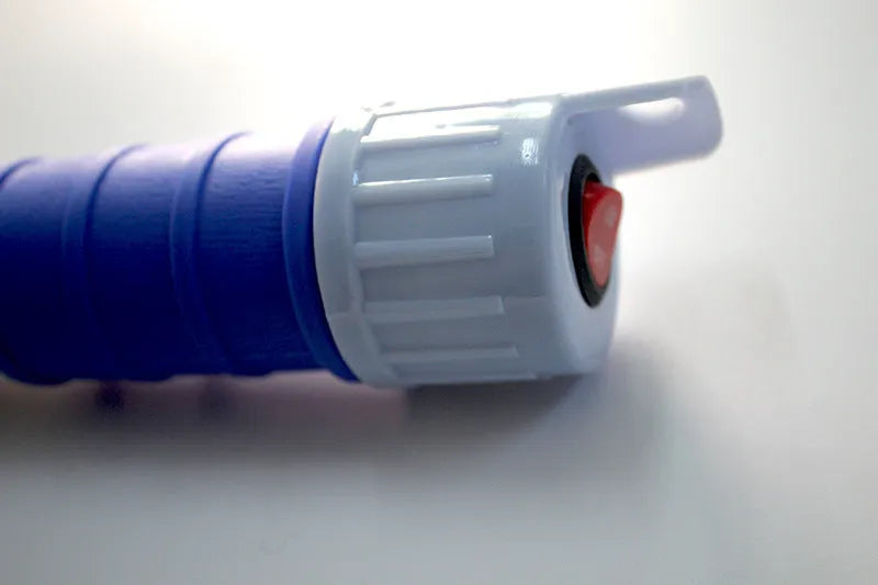Blue and red manual siphon pump for fuel and liquid transfer