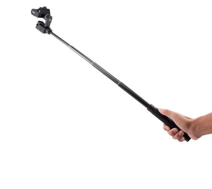 Black retractable selfie stick extended to 100cm with phone attached and Bluetooth remote