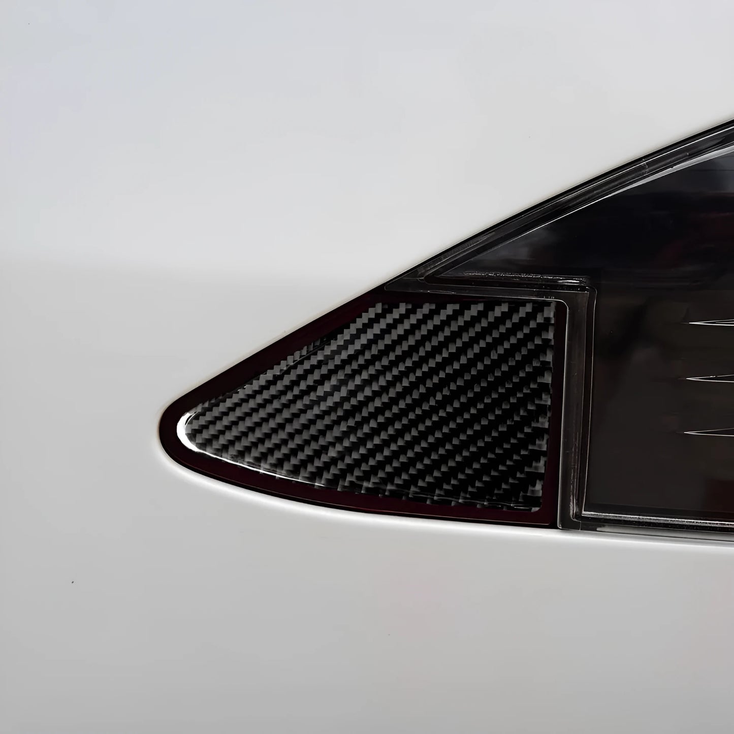 Carbon fibre decorative sticker for car USB charging port panel with 3M adhesive backing.