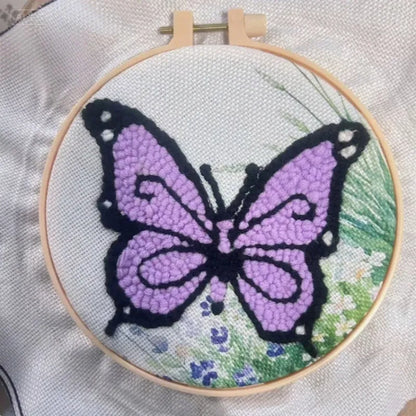 Beginner embroidery craft suit showing six cartoon designs including turtle, sheep, horse, fox, butterfly, and mermaid patterns