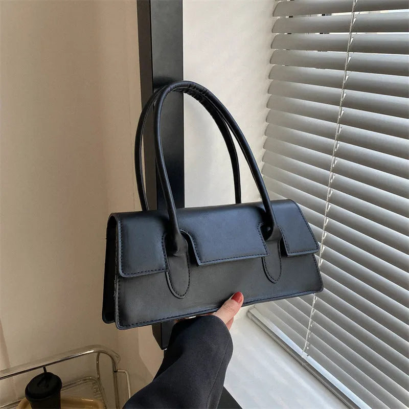 Women's black PU leather square shoulder bag with stitching detail and single strap