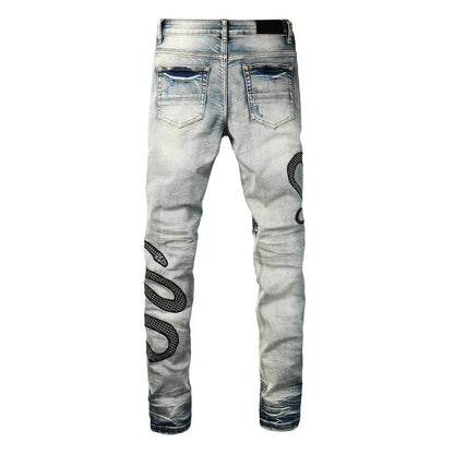Blue distressed skinny jeans with street fashion wash and mid waist design