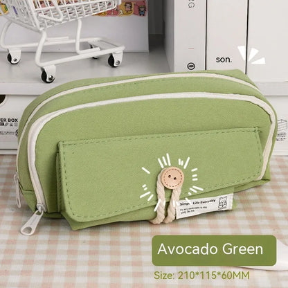 Korean style canvas pencil case with button closure, shown in beige, holding multiple pens.