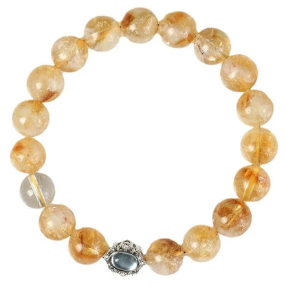 Polished citrine crystal bracelet with 10mm geometric beads on wrist