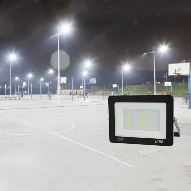 Black LED flood light with aluminium shell and glass cover, IP65 waterproof, 120° beam angle, 10W to 300W, cool white.