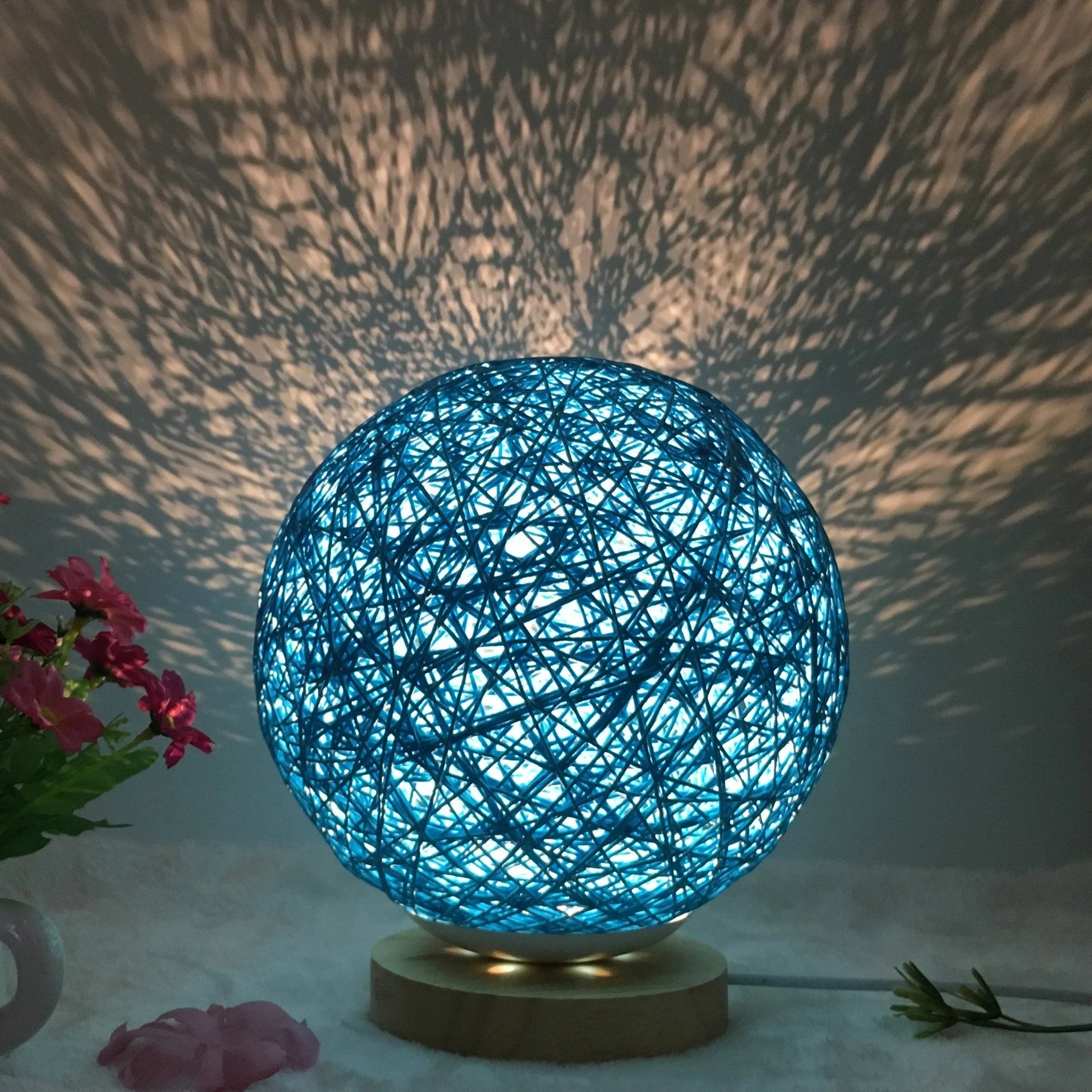 LED rattan table lamp with hand-knit linen shade in various colours