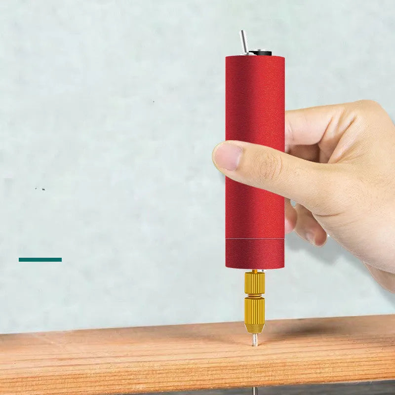 Small silver aluminium USB electric grinder tool with three drill bits and a wrench on a white background.