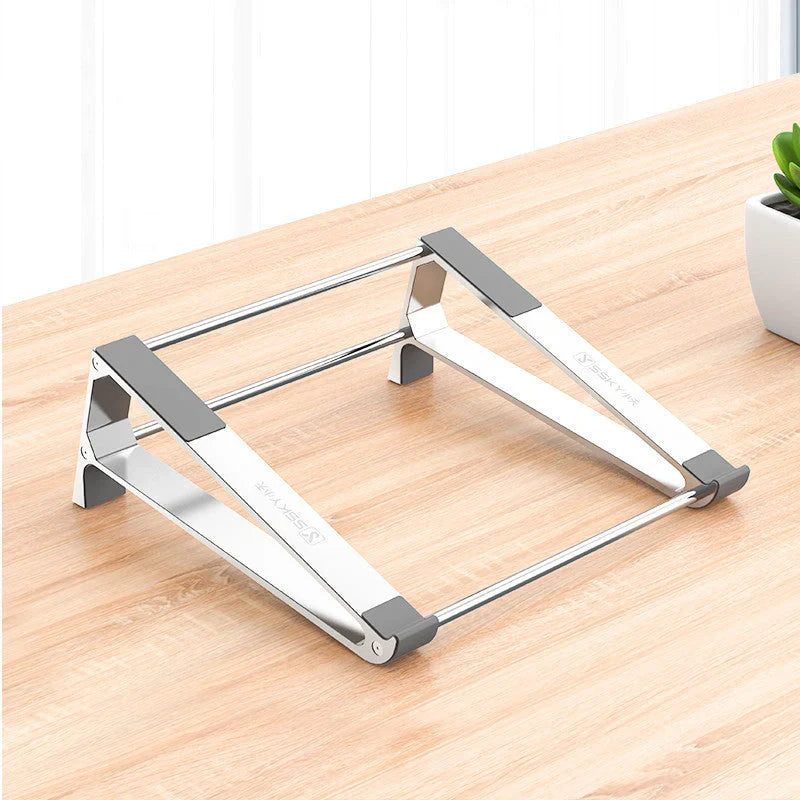 Aluminum alloy portable laptop stand with non-slip silicone pads in Space Grey and Aurora Silver