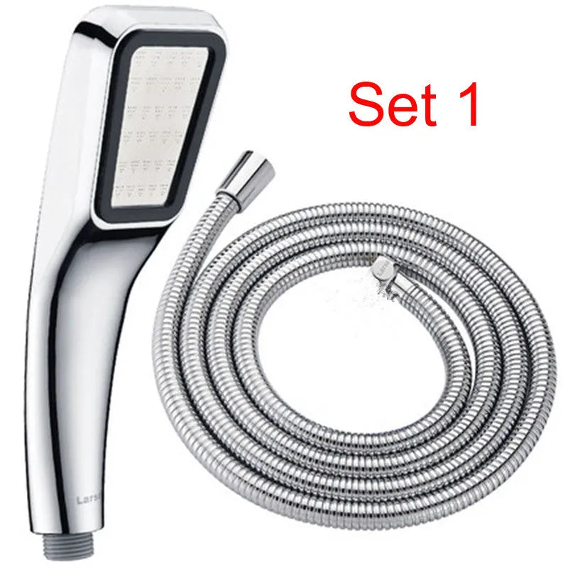 Orange hand-held pressurised shower head with rain function and attachment pieces