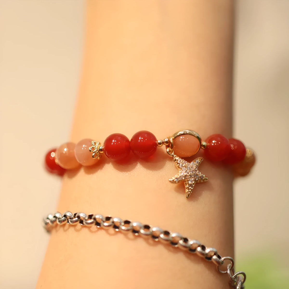 Handmade red agate and sunstone ethnic bracelet with star and Xiangyun designs for women