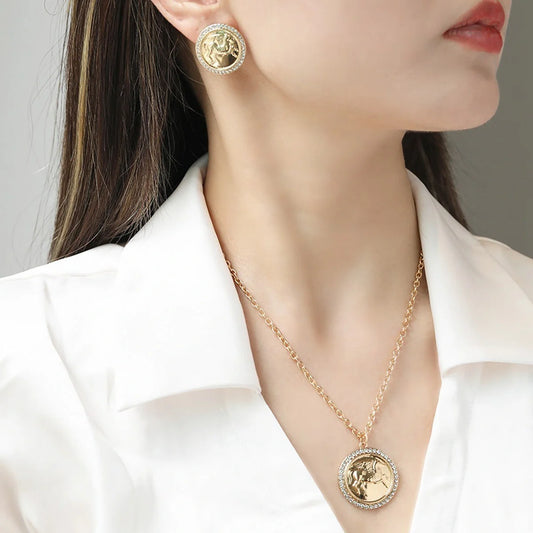 Exquisite Pegasus coin necklace and earrings set in an antique-inspired design, showcasing intricate relief carvings of the mythical winged horse from ancient Greek legend.