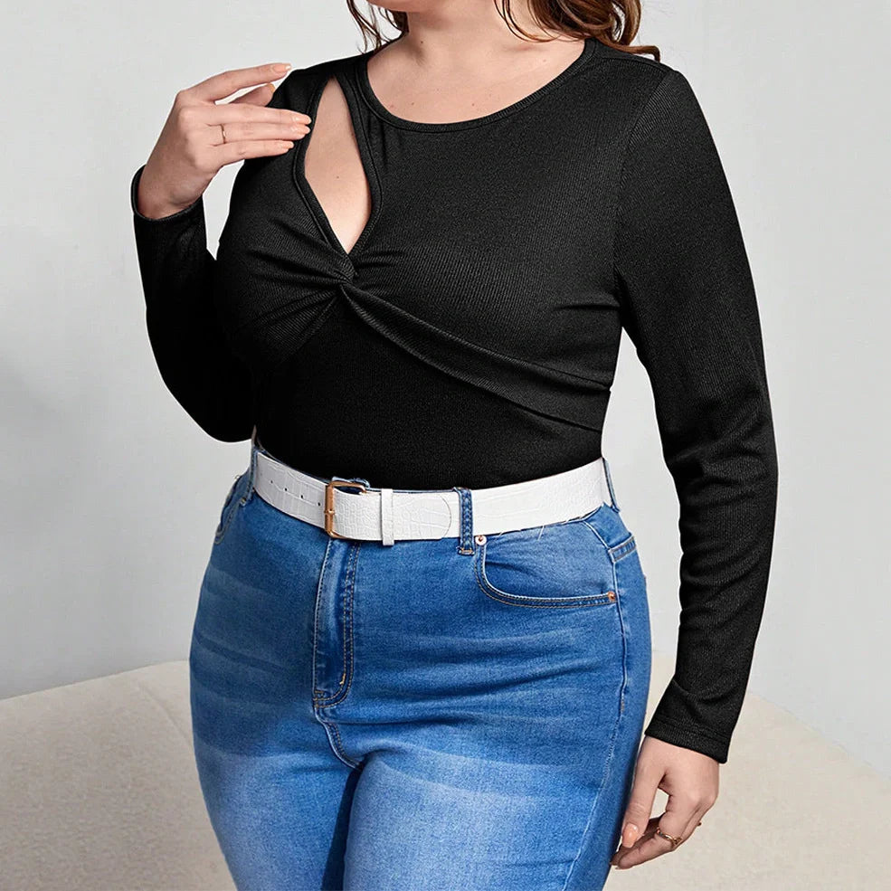 Black women's long-sleeved top with hollow-out design detail, slim fit with 3D cutting
