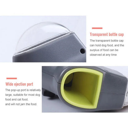 Grey-coloured pet treat catapult launcher for dogs and cats on a plain background.