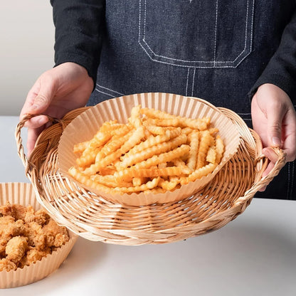 Disposable air fryer liners made from high-quality parchment paper, designed to keep your air fryer clean and your meals healthy