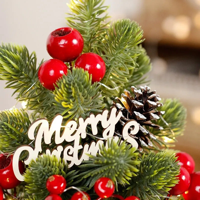 32cm tall desktop Christmas tree with LED-lit pine cone ornaments in red, champagne, or dark brown.