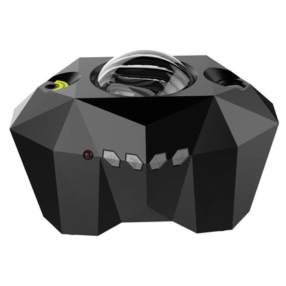 Black and white LED Dream Aurora Borealis light projector with remote control on a table