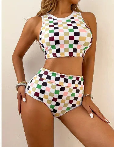 Women's checkerboard print backless one-piece swimsuit with suspender straps for swimming.