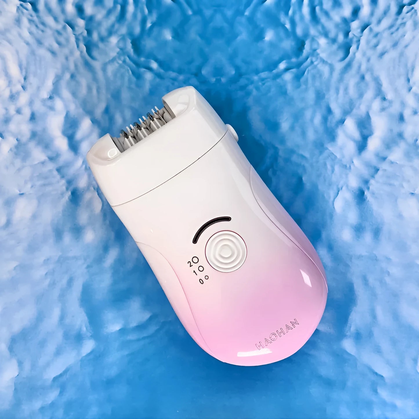 Pink three-in-one USB electric hair removal device with shaving head, grinding head, and skin rub attachment