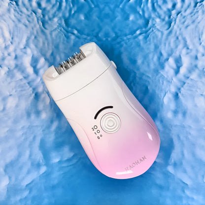 Pink three-in-one USB electric hair removal device with shaving head, grinding head, and skin rub attachment