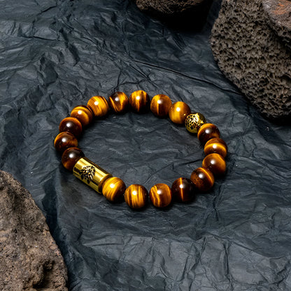Little Lion ethnic geometric bracelet made from brown Bodhi seed beads on a wrist.