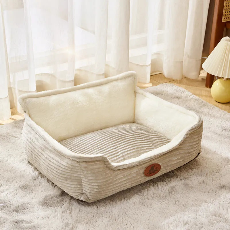 Coffee coloured removable washable pet kennel cushion bed for small medium dogs cats on a wooden floor