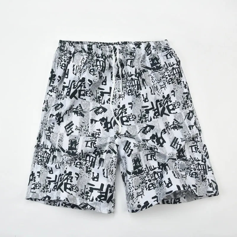 Men's floral patterned swim shorts with five-point cut design