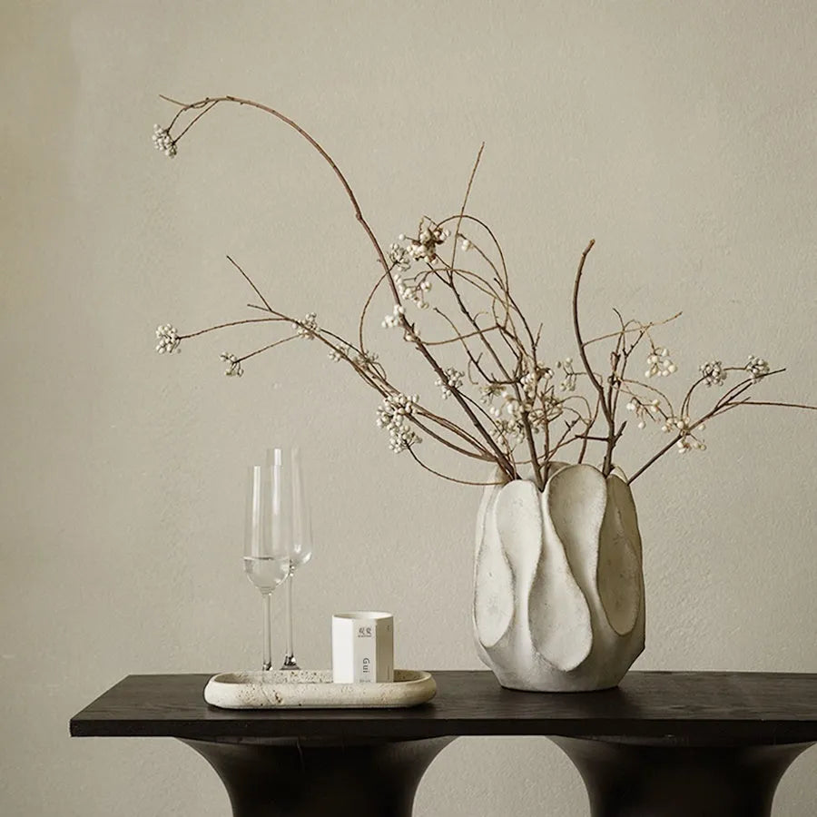 Hand-formed irregular ceramic vase measuring 25cm tall with 15cm diameter opening, made from magnesium clay