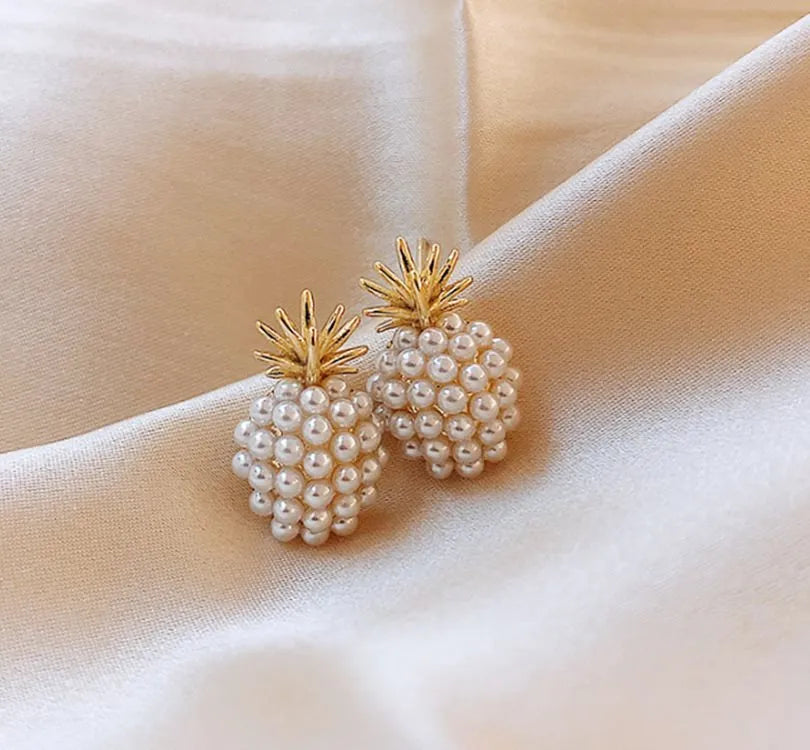 Korean style pineapple and starfish motif earrings with pearl accents in gold, silver, pearl flower, or starfish pearl finish.