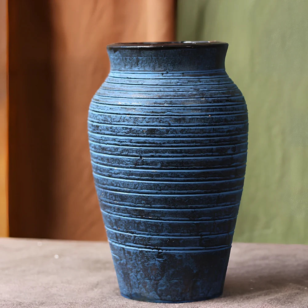 Ceramic mosaic vase with dried flower arrangement, handcrafted surface detailing