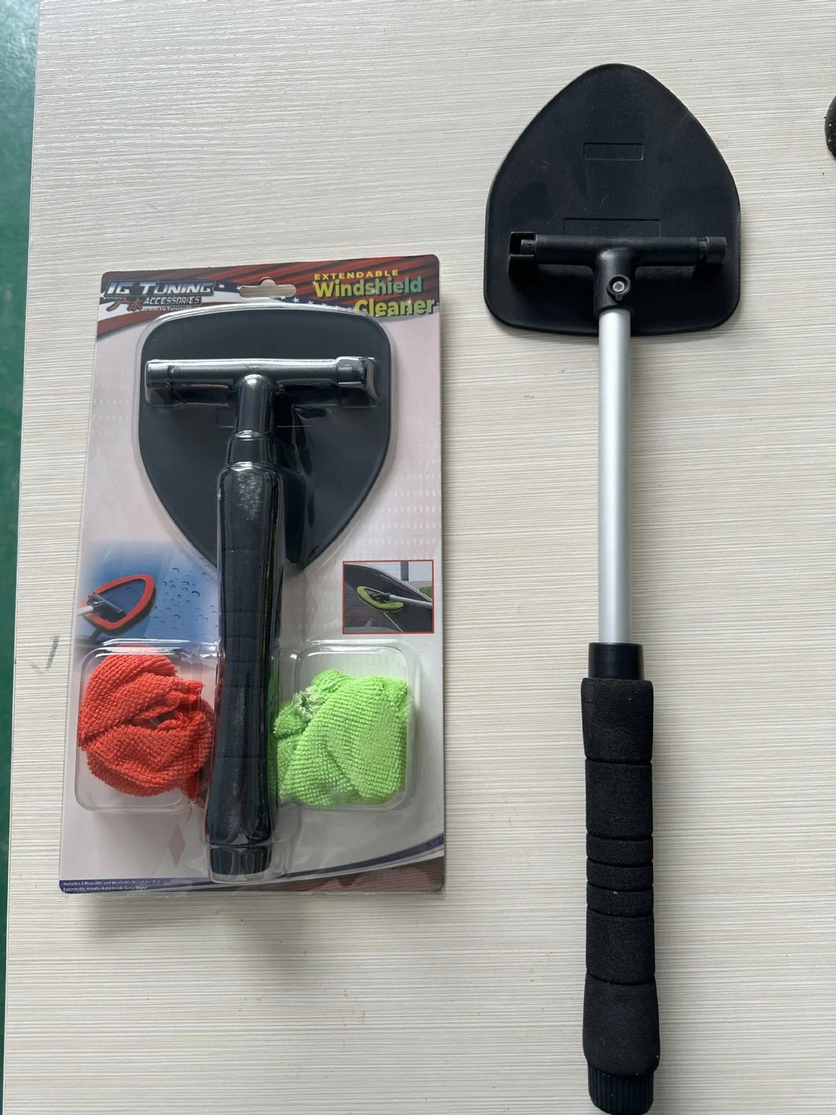 Plastic car windshield window cleaning brush in red, green, and sapphire blue colour options