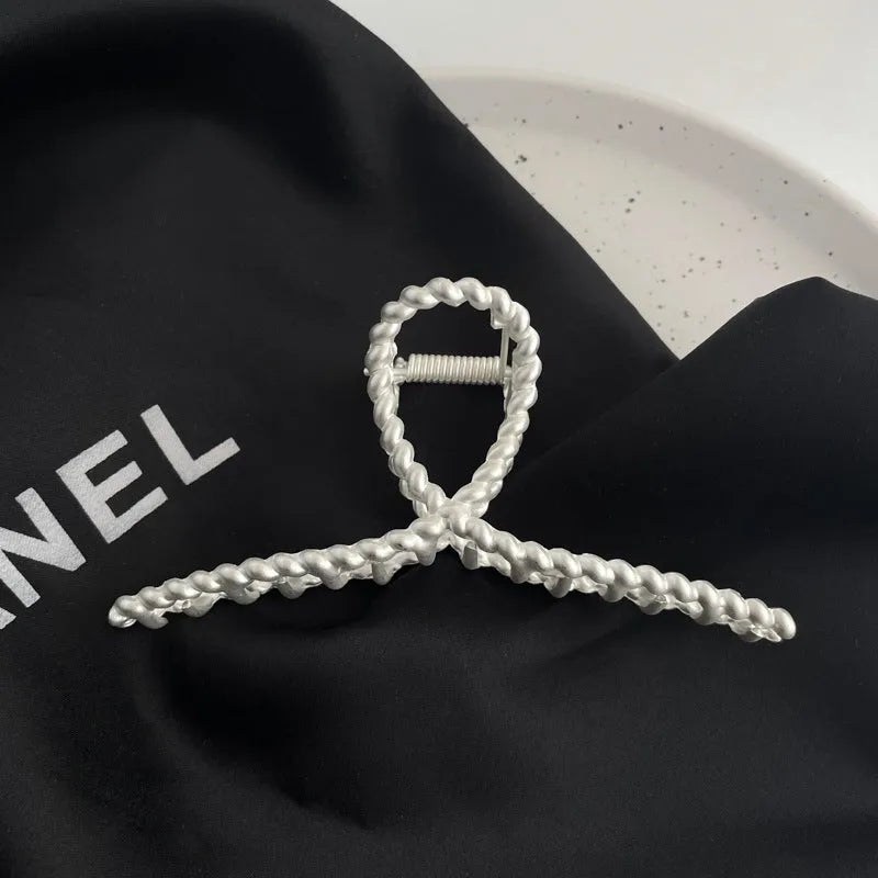 Silver metal hair claw barrette example from a range of 44 Korean-style designs.