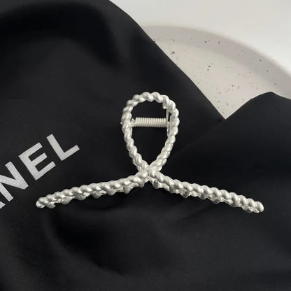 Silver metal hair claw barrette example from a range of 44 Korean-style designs.