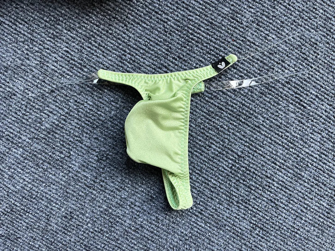 Invisible transparent belt low waist pouch underpants in nylon, T-back style, available in six colours and sizes M to XXL